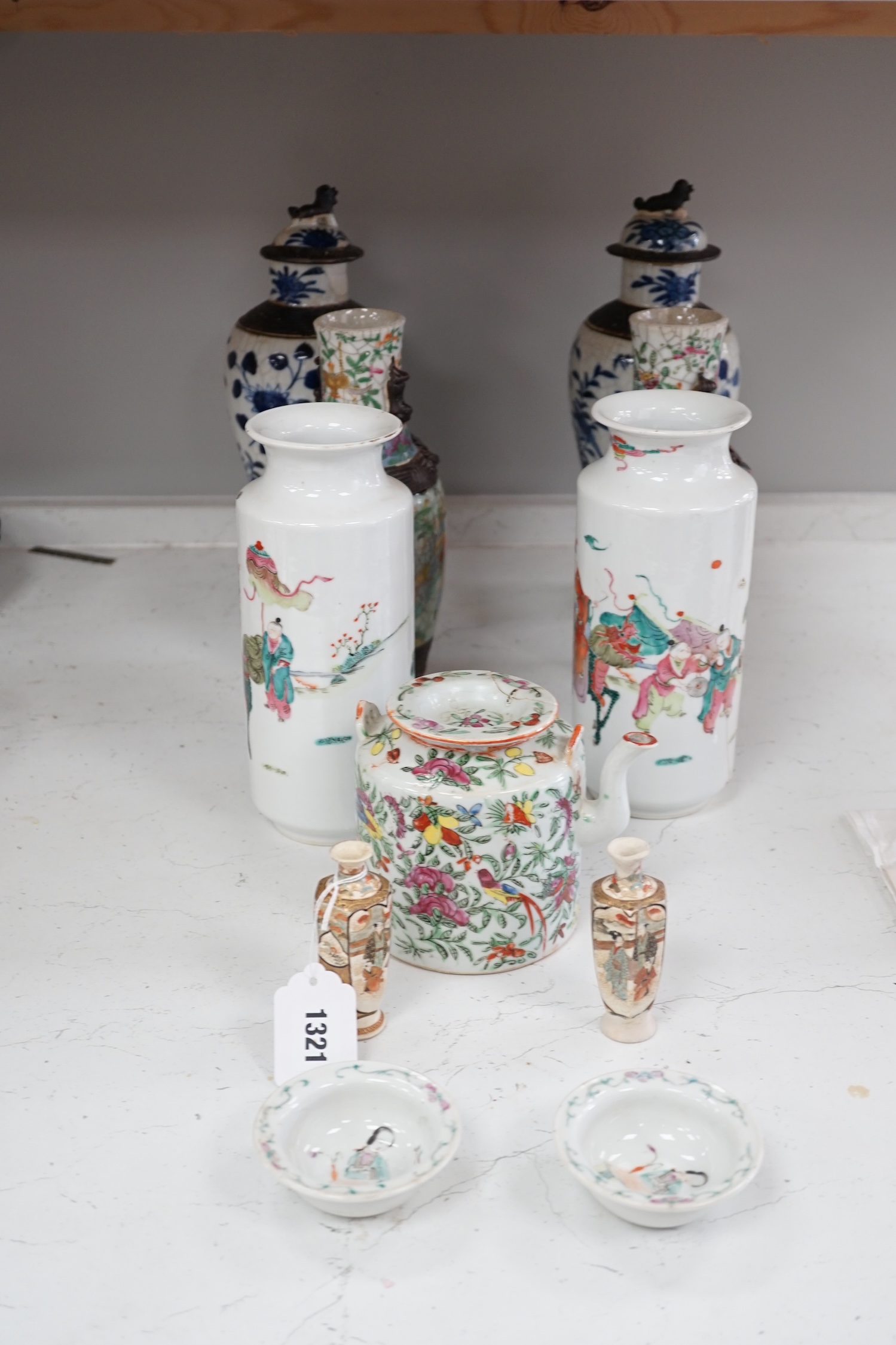 Three pairs of Chinese vases, a teapot, two bowls and a pair of miniature Satsuma vases, tallest item crackleware vases and covers 32cm high. Condition - poor